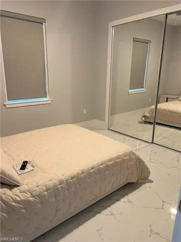 Mirrored closet doors providing visual expansion