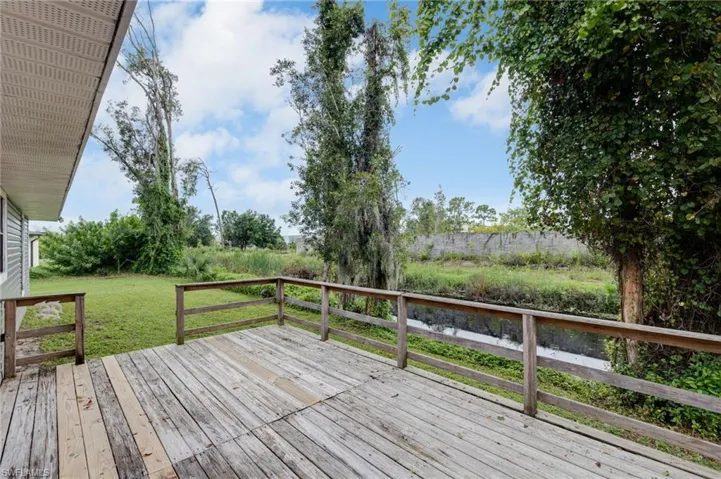 Wooden deck with a lawn