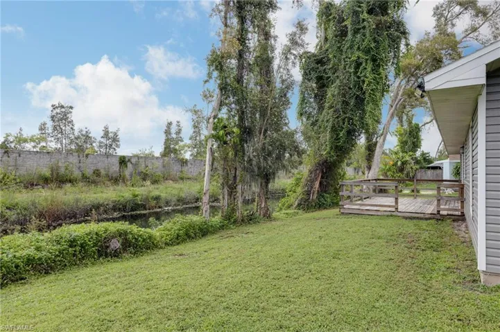 View of yard featuring a deck