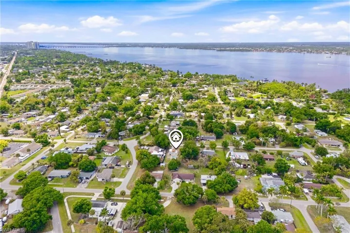 Sweeping overhead view highlighting the neighborhood layout, street design, and surrounding area.