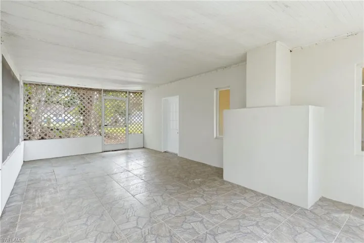 Inviting covered patio area, perfect for relaxing in any weather.