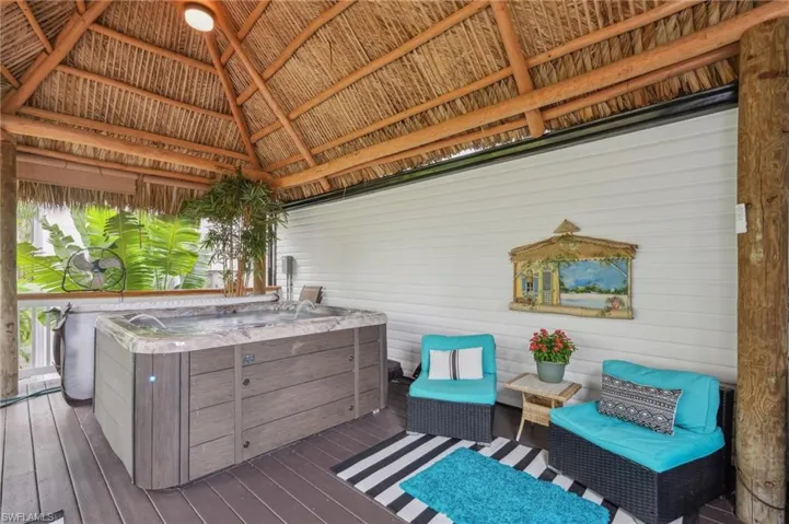 Deck featuring a hot tub