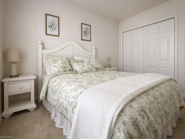 Bedroom with carpet floors and a closet