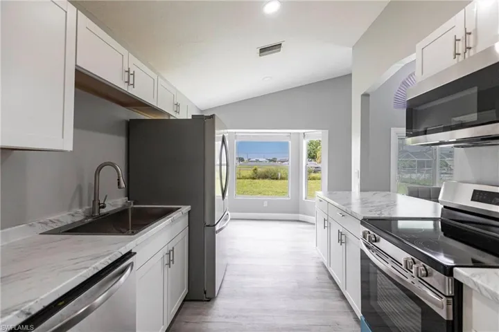 1214 NE 5th  PL, Cape Coral, FL 33909