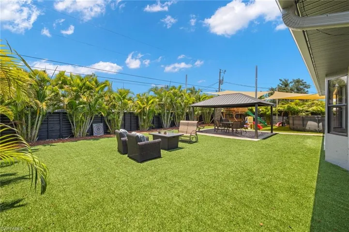 View of yard featuring a patio and outdoor lounge area