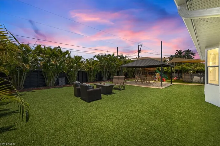 Yard at dusk with a patio