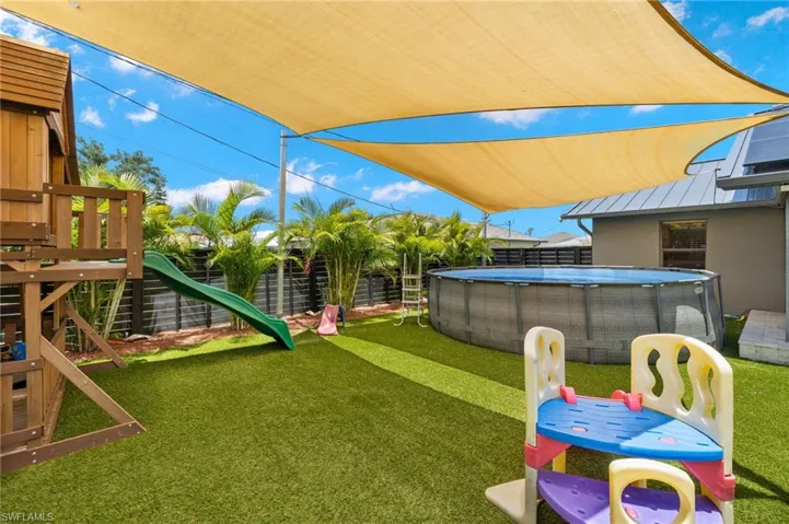 View of yard featuring a playground