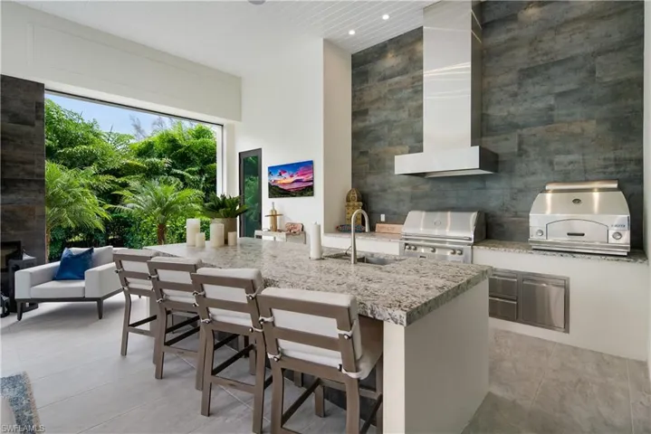 Outdoor kitchen including Grill and Pizza oven