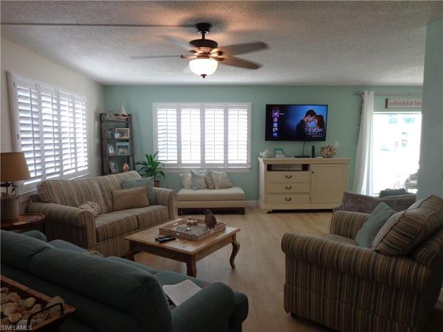 JUST ANOTHER ANGLE OF THE GREAT ROOM SHOW CASING THE SIZE OF THE SPACE ALONG WITH THE SUNLIGHT STREAMING THROUGH THE HURRICANE RATED WINDOWS