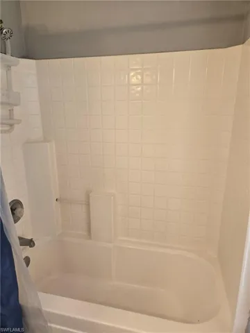 Full bathroom featuring tub / shower combination
