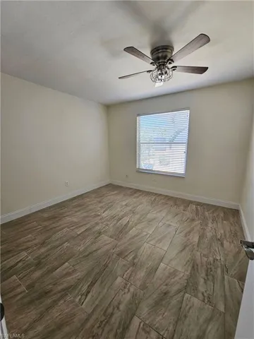 Spare room with baseboards