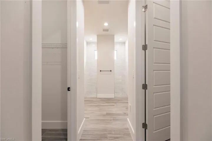 Hall with light wood-type flooring