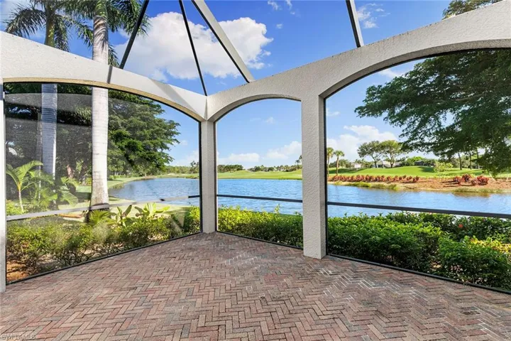 This additional lanai area compliments the outdoor living space and long water views out to the 9th hole fairway