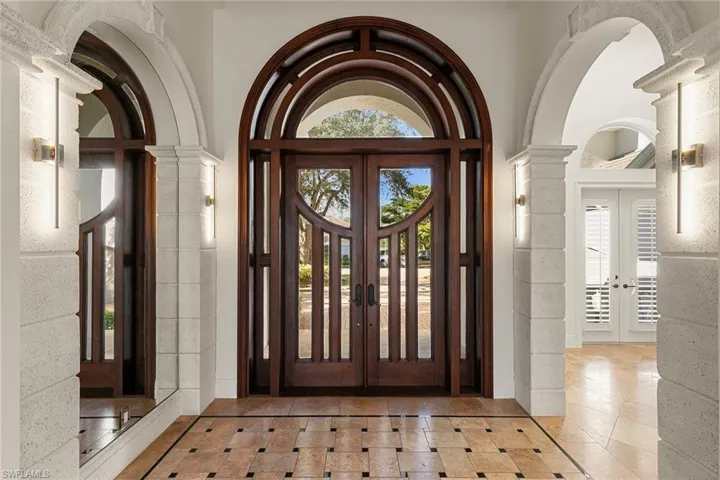 The grand entrance way welcomes you home