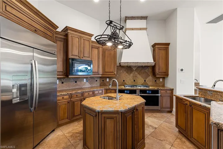 Open concept kitchen complete with all new GE Profile - WiFi capable appliances that includes dual ovens and gas cooktop range