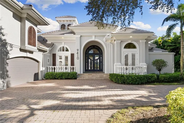 The oversized 3 car garage yields to a spacious driveway that accommodates 8+ additional vehicles