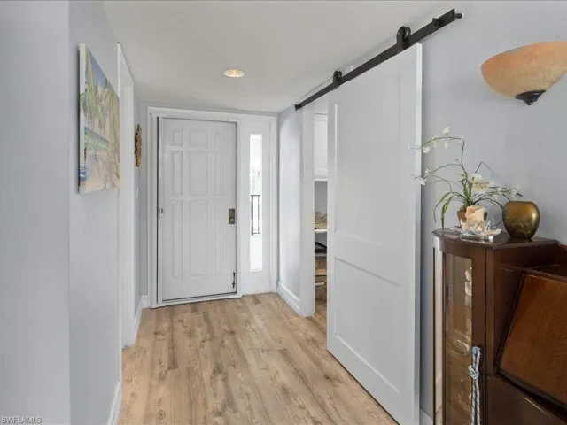 Note barn door leading to office space