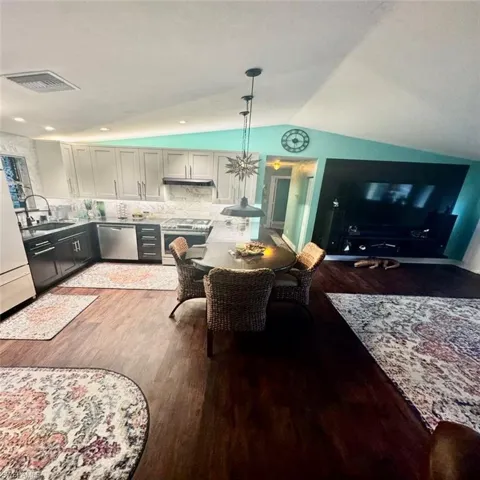 Kitchen + Living Room with pendant lighting