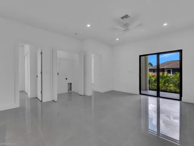Spare room featuring recessed lighting, ceiling fan, and light tile patterned floors