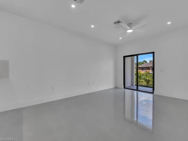 Unfurnished room featuring recessed lighting, a ceiling fan, and tile patterned floors