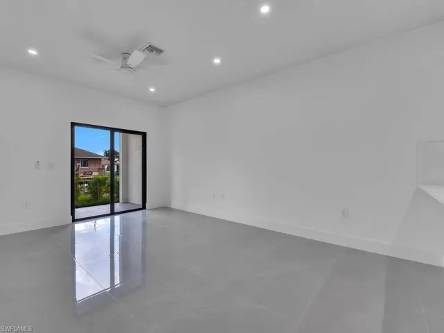 Unfurnished room featuring recessed lighting, a ceiling fan, and light tile patterned floors