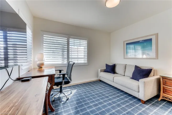Office area with carpet floors and baseboards