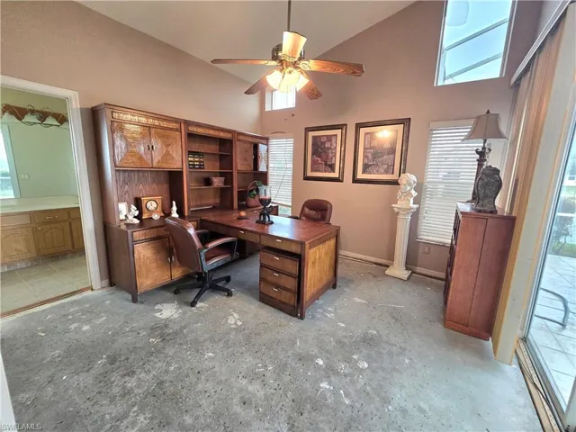 Primary has sliders, 3 windows with lanai & Lakeview. Carpet has been removed.