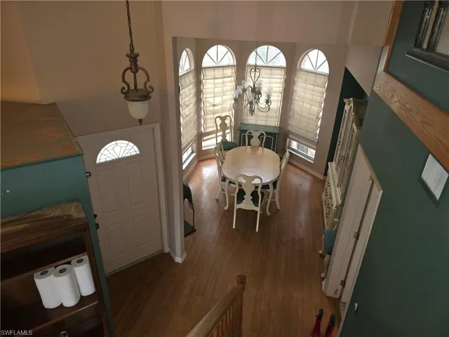 Front Door & Dining Room from staircase landing.