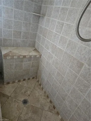 Rear Master Shower with built-in seat.