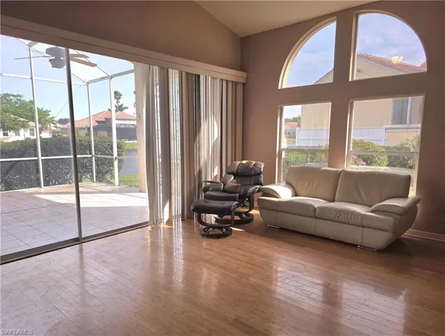 Great Room with bamboo flooring, sliders to lanai.