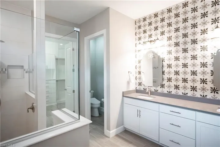 Bathroom featuring toilet and vanity