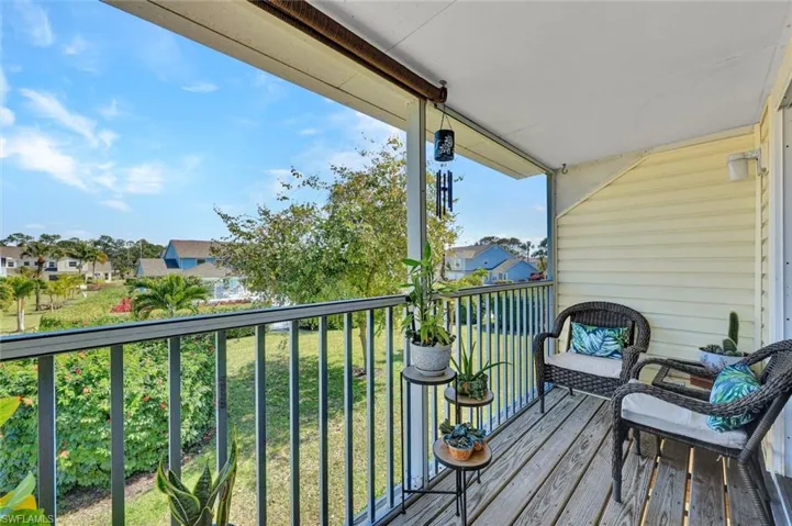 Balcony featuring a residential view