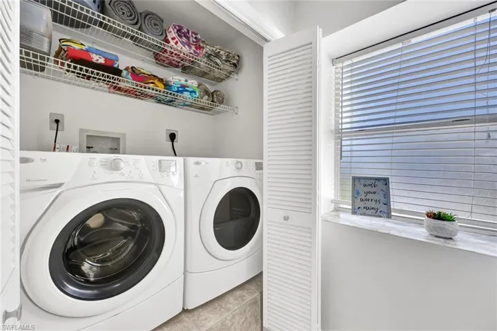 Laundry area with separate washer and dryer