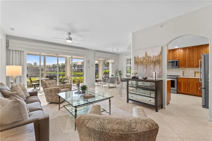 Open floor plan of Living-Dining-Kitchen. Light and bright overlooking the lake.