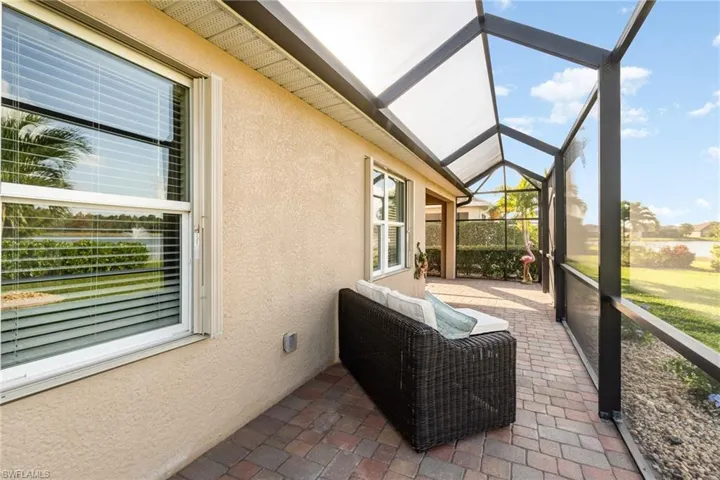 Extended screened lanai featuring plenty of natural light