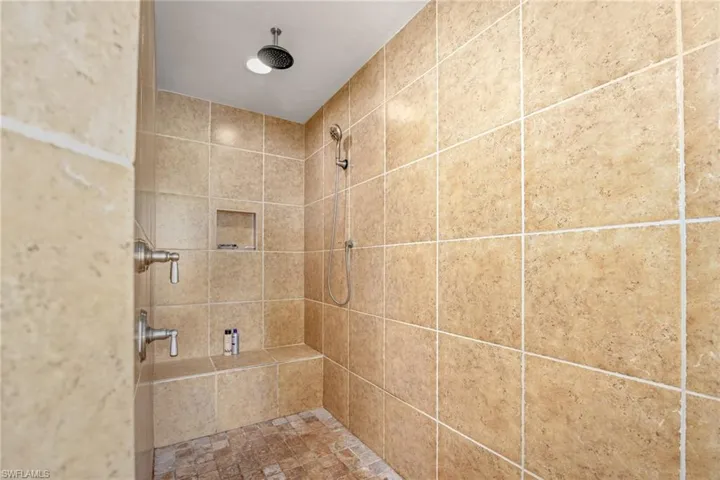 Bathroom with a tile shower