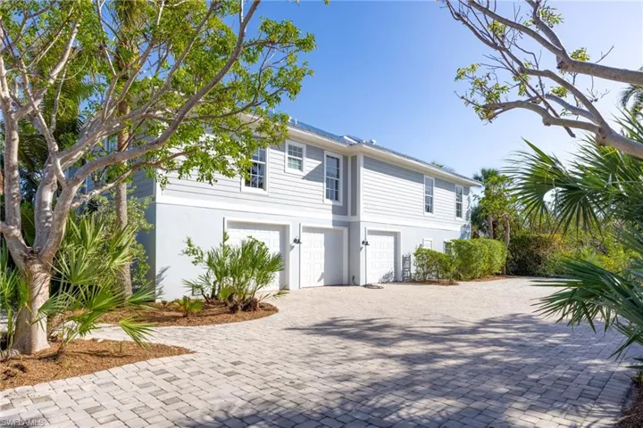 View of front of house with 3 car garage