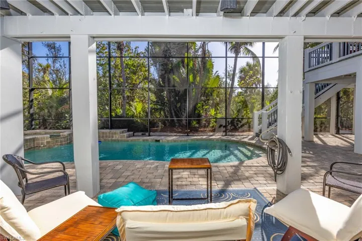 View of swimming pool with a patio area. Remote Controlled Spa