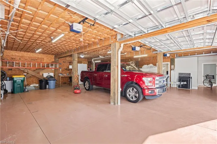 3 car garage with a garage door opener