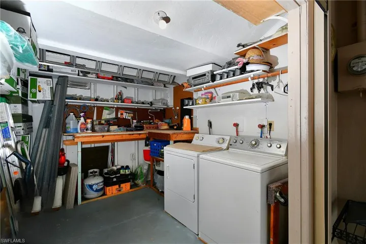 Laundry room / storage, with custom made electric garage door.
