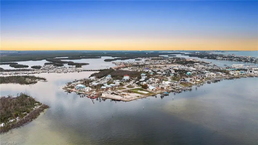 Aerial view at dusk with a water view