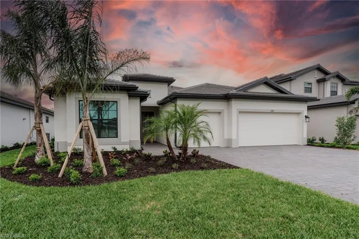 Contemporary stucco exterior with a gray tile roof