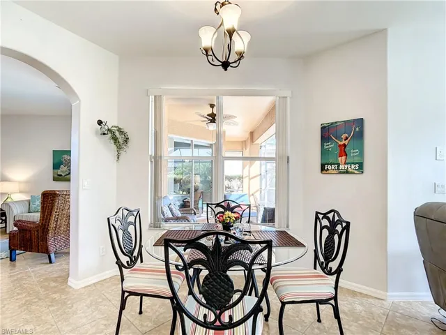 Bright  breakfast nook and decorative overhead light