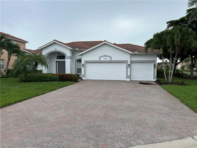 Single level home, spacious paved driveway and 3 car garage