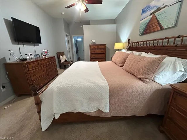 Kings size bed, decorative ceiling fan