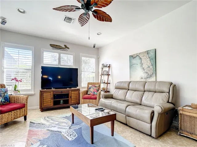 Spacious Family area, ceiling fan and plantation shutters