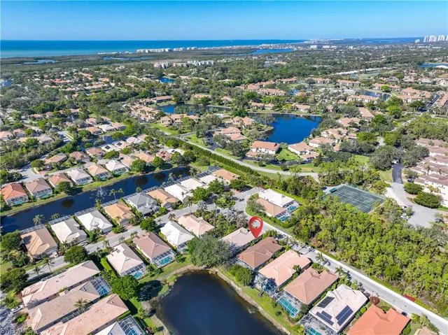 Aerial view featuring a water view