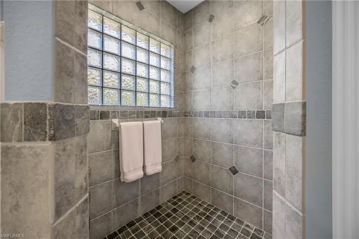 Bathroom with tiled shower