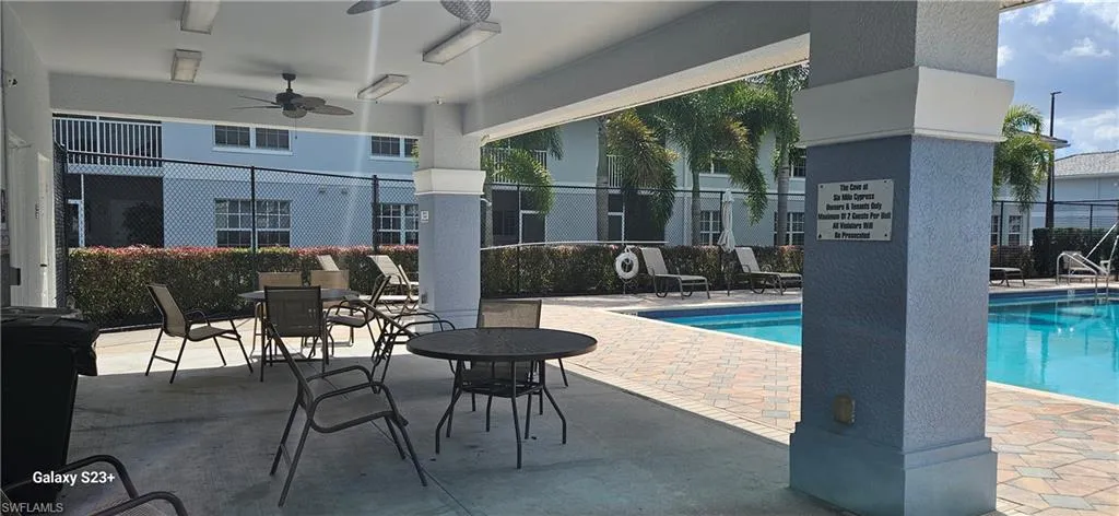Community pool featuring a patio area