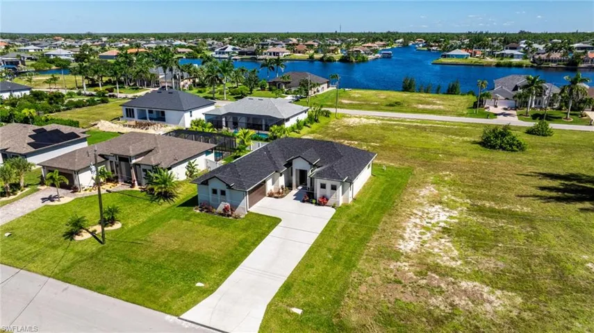 Aerial view of residential area with a large body of water